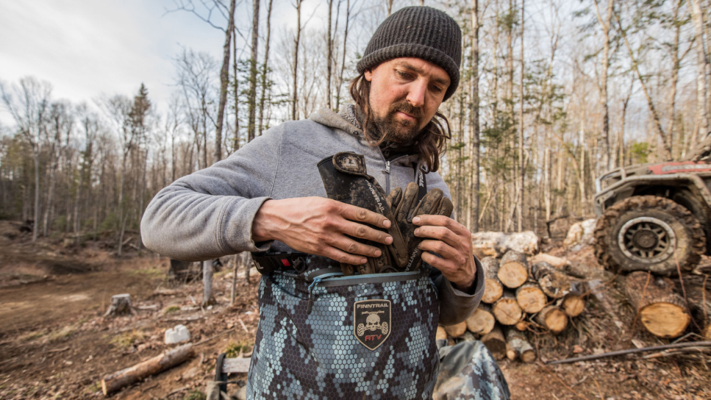 man with atv riding gloves