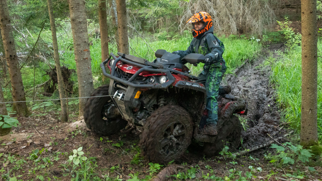 winching atv in the woods