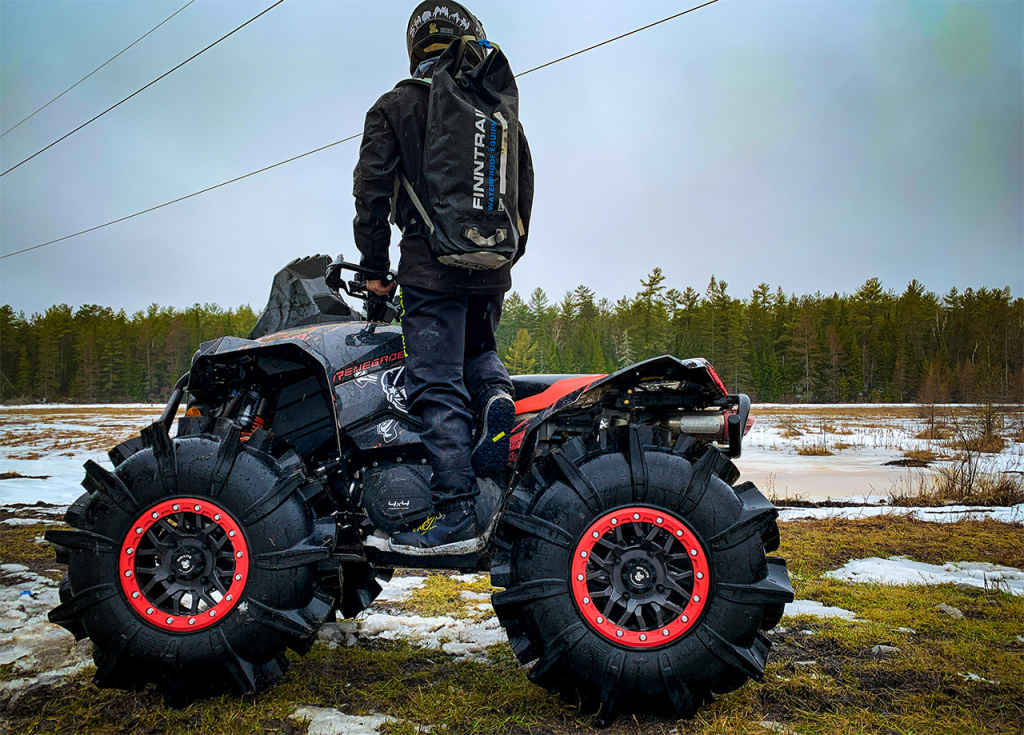 atv rider with backpack