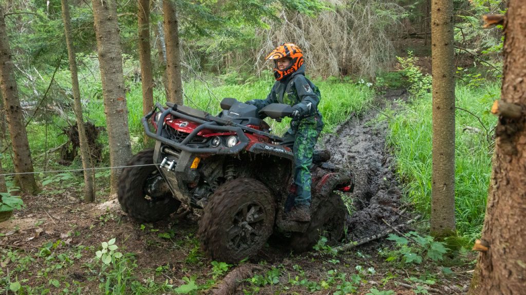 atv riding in woods