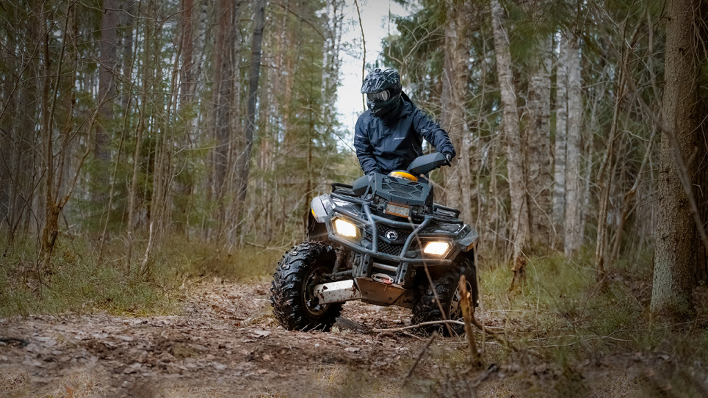 atv trail riding in the wood