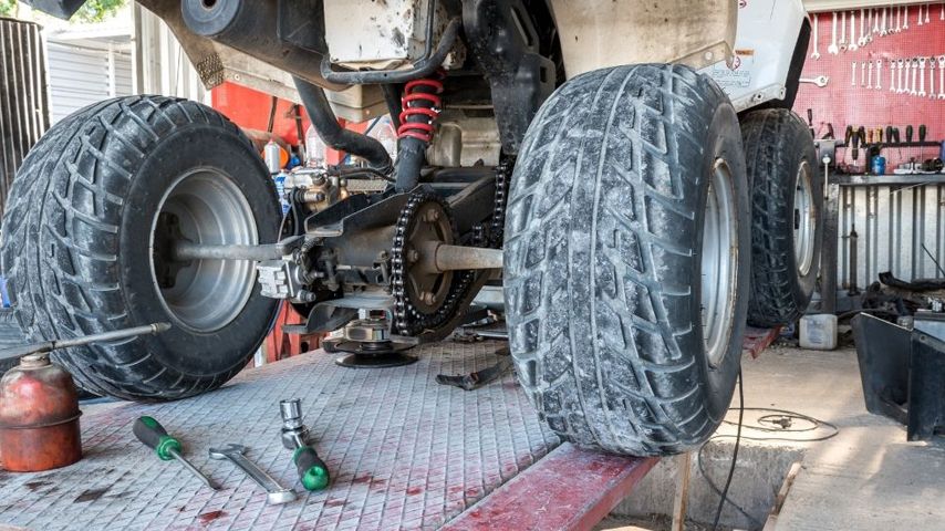 repair atv in garage