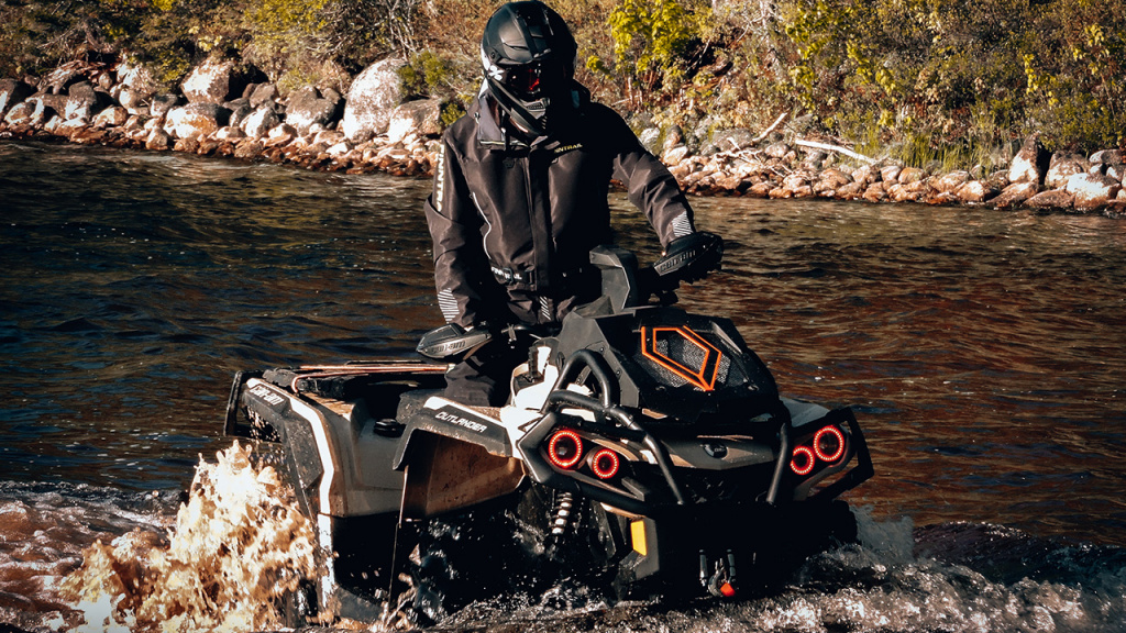 rider riding on water and mud 