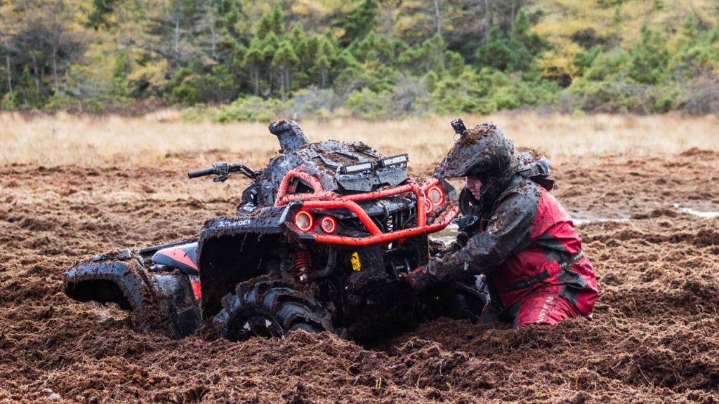 atv with winch in mud