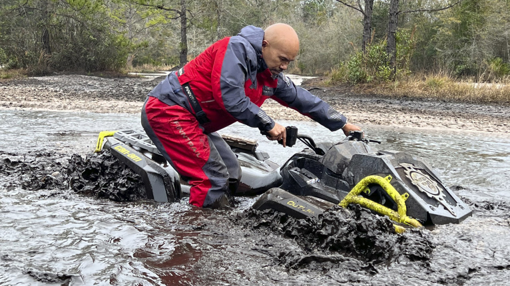 atv riding in water.