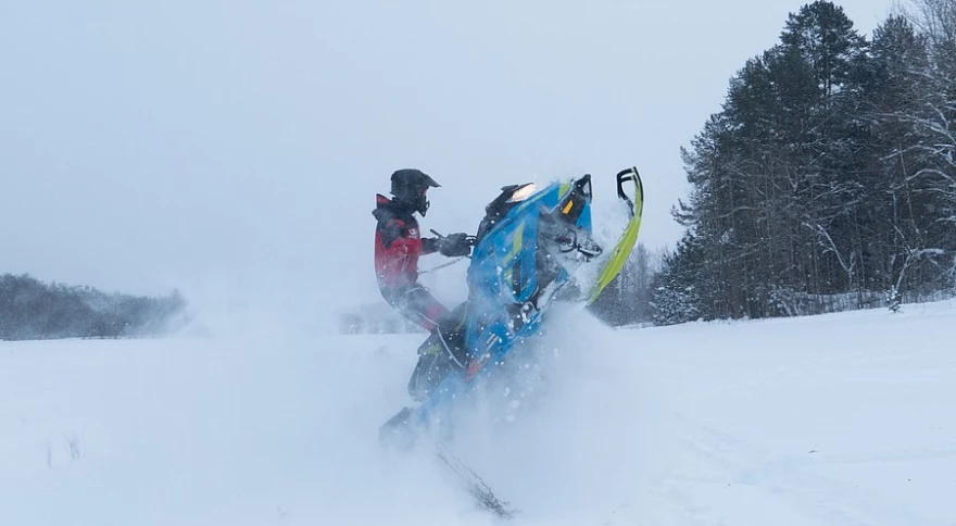 Discover the Magic of Guided Snowmobile Tours & Trips