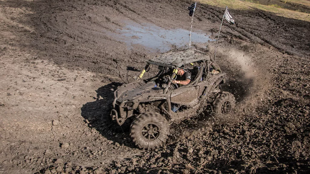 utv riding in mud event.jpg