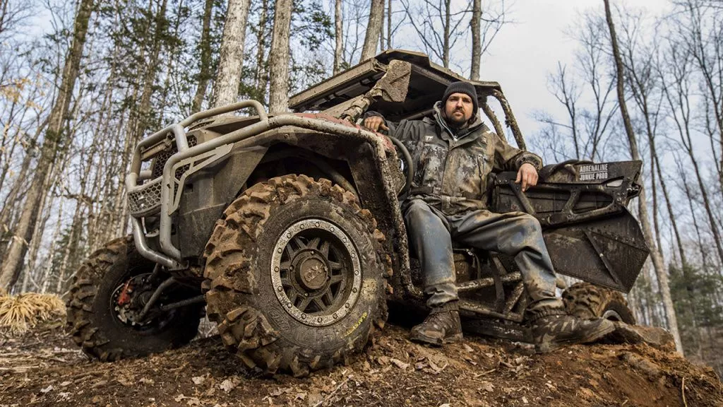 polaris rzr rider in woods.jpg polaris rzr rider in woods.jpg